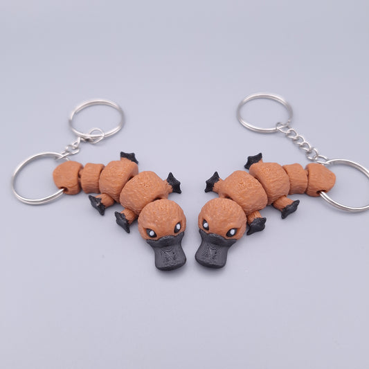 Mini platypus fidget keychain with flappy limbs and round body