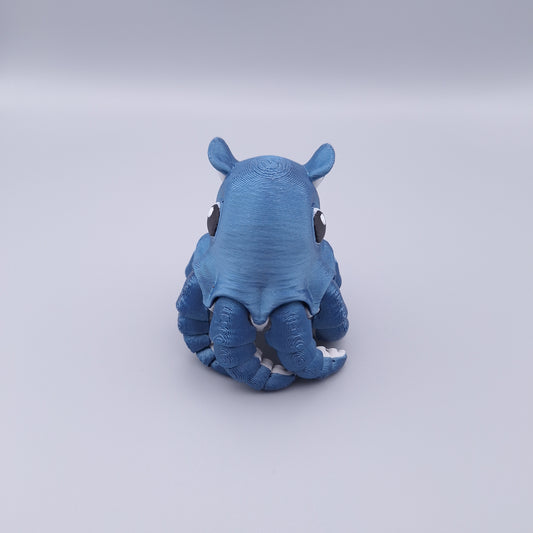 Cute octopus fidget toy with rounded body and eight articulated tentacles