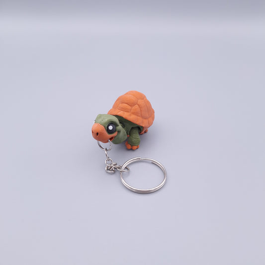 Mini turtle fidget keychain with round shell and cute face