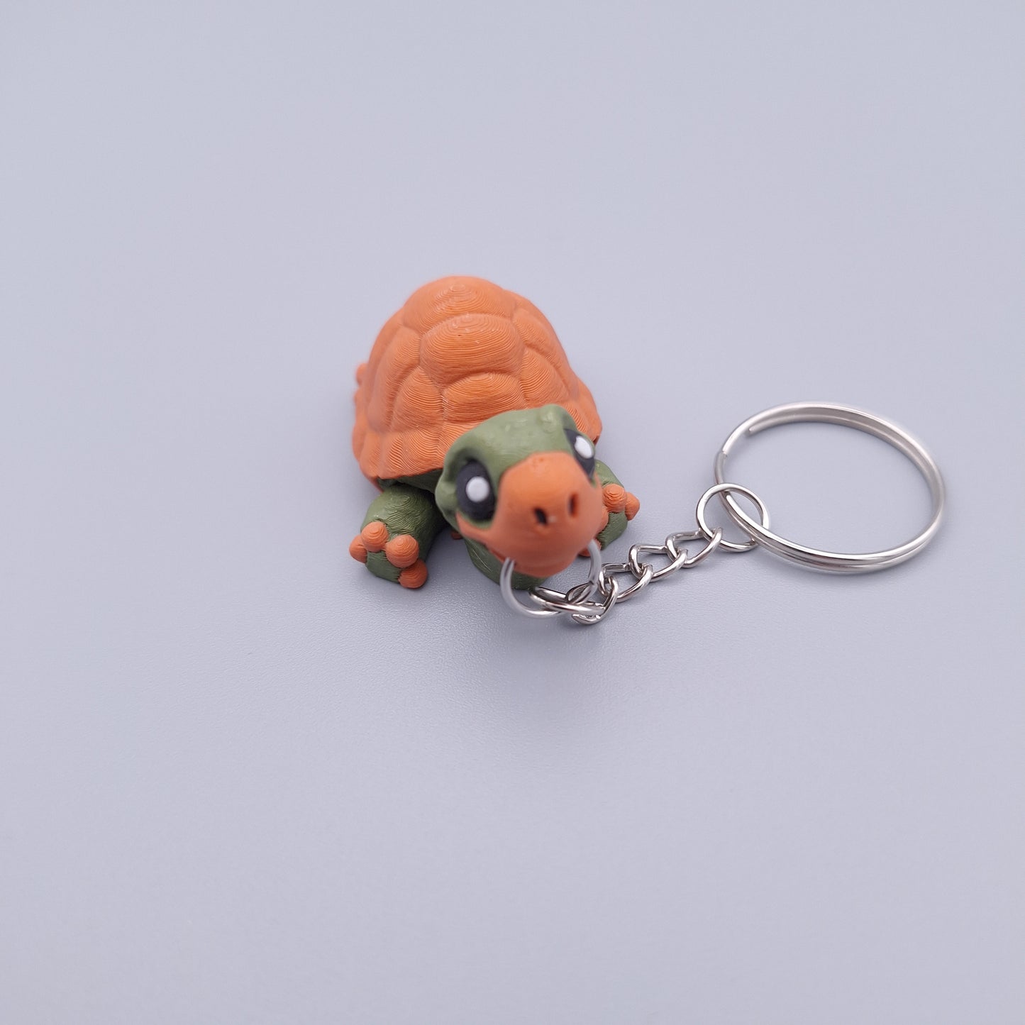 Mini turtle fidget keychain with round shell and cute face