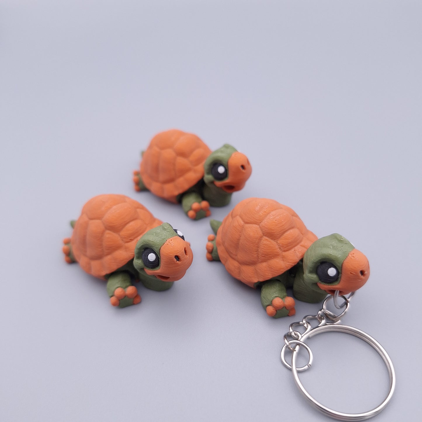 Mini turtle fidget keychain with round shell and cute face