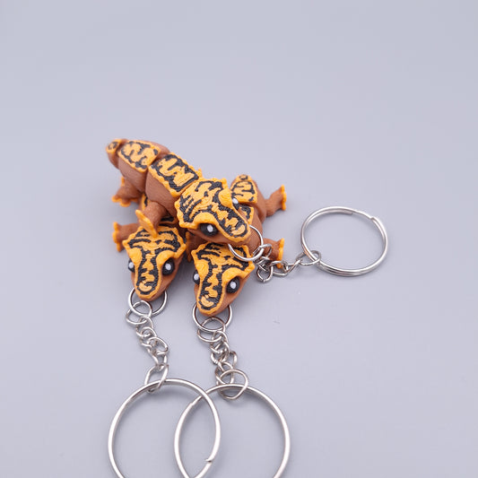 Mini gecko fidget keychains with short tails