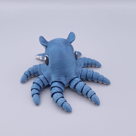 Cute octopus fidget toy with rounded body and eight articulated tentacles