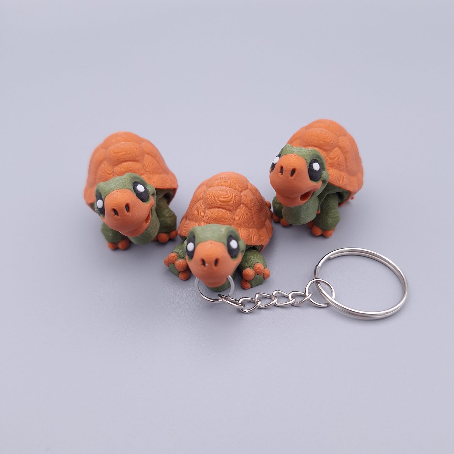 Mini turtle fidget keychain with round shell and cute face
