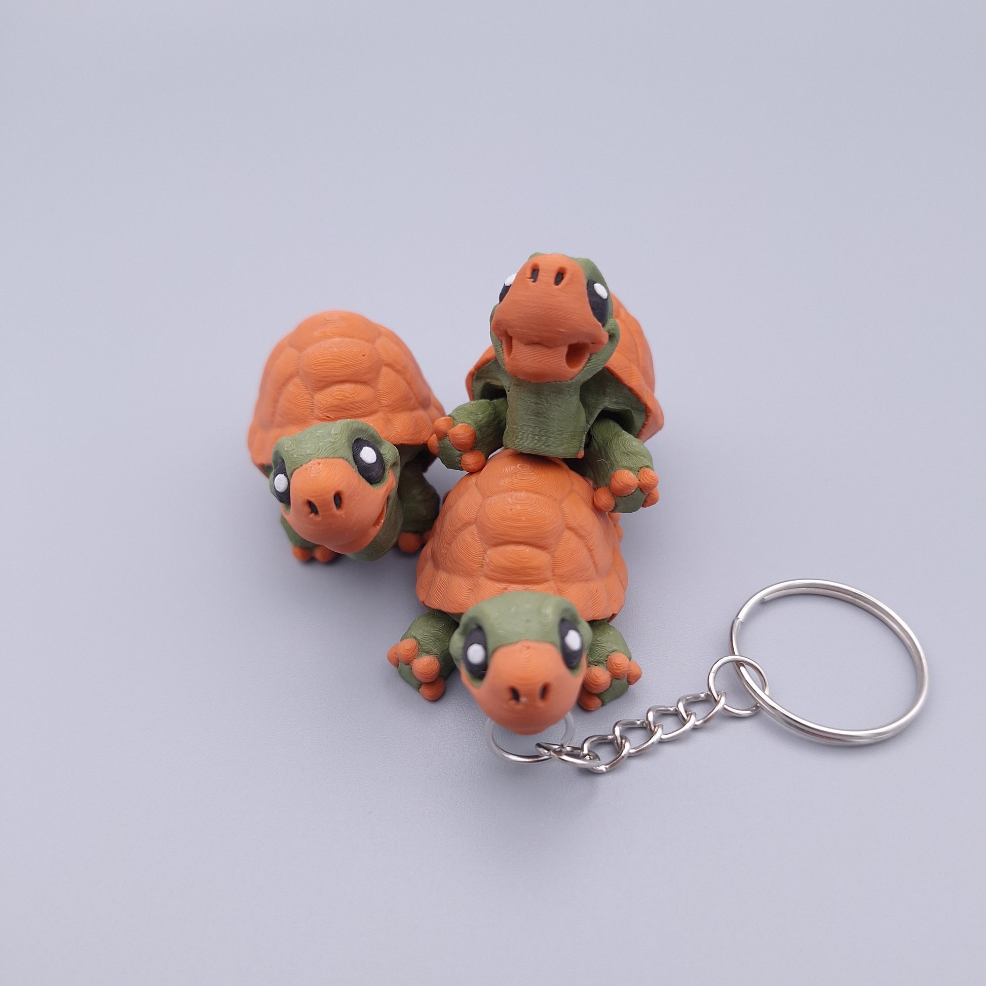Mini turtle fidget keychain with round shell and cute face